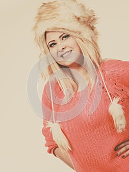 Attractive woman wearing furry winter hat