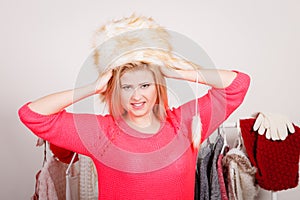 Attractive woman wearing furry winter hat