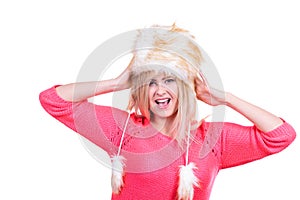 Attractive woman wearing furry winter hat