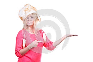 Attractive woman wearing furry winter hat