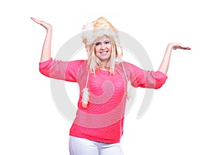 Attractive woman wearing furry winter hat