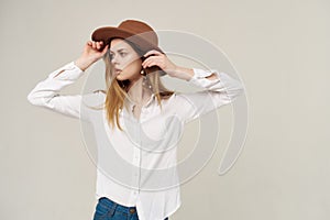 attractive woman wearing hat decoration white shirt charm street style