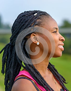 Attractive young African woman with braids