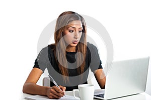 Attractive young asian indian teenage woman, studying with laptop