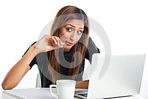 Attractive young asian indian teenage woman studying with laptop