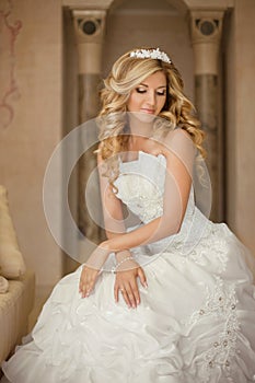 Attractive young bride woman in wedding dress. Beautiful girl wi