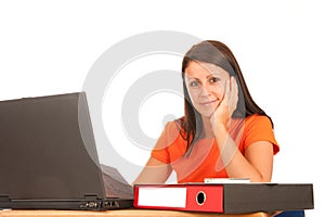 Attractive young brunette working on laptop