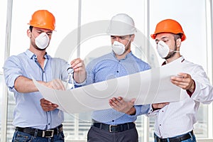 Attractive young builders are working on a new