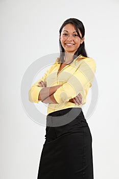 Attractive young business woman arms folded