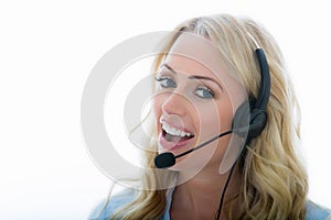 Attractive Young Business Woman Using a Telephone Headset