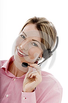 Attractive Young Business Woman Using a Telephone Headset