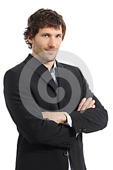 Attractive young businessman posing with folded arms