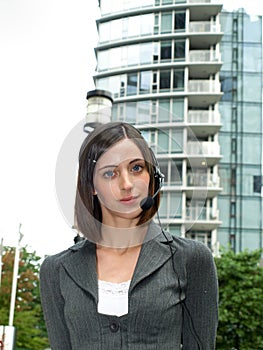 Attractive young businesswoman with headset