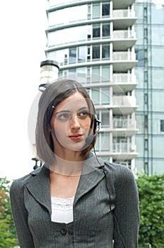 Attractive young businesswoman with headset