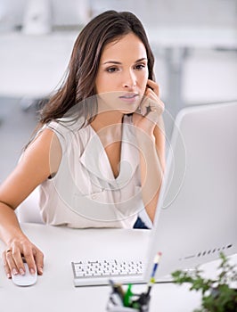Hmm, this seems a bit problematic. An attractive young businesswoman working on solving a problem.