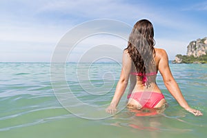 Attractive Young Caucasian Woman In Swimsuit On Beach Back Rear View, Girl Blue Sea Water Holiday