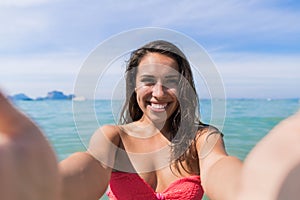 Attractive Young Caucasian Woman In Swimsuit On Beach Taking Selfie Photo, Girl Blue Sea Water Holiday