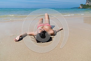 Attractive Young Caucasian Woman In Swimsuit Lying On Beach, Girl Wet Sand Sea Ocean Holiday