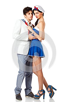 Attractive young couple roleplay in sailor uniform photo