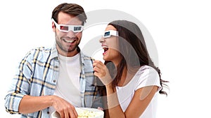 Attractive young couple watching a 3d movie