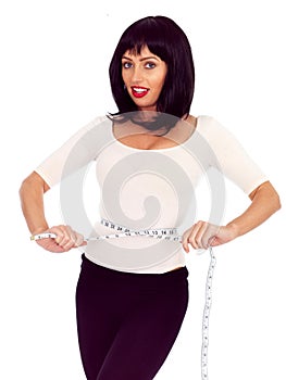 Attractive Young Dark Haired Woman Holding Tape Measure