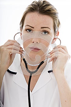 Attractive Young Female Doctor With a Stethoscope