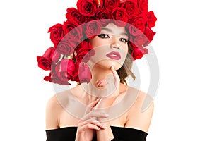 Attractive young girl with fashionable red roses hairstyle