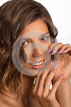 Attractive young girl with NailArt . photo