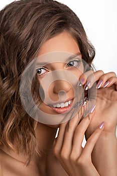 Attractive young girl with NailArt . photo