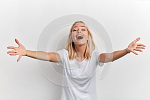 Attractive young girl with outstretched hands going tohug