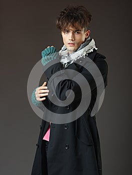 Attractive young male model posing in the studio