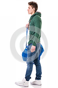 Attractive young man with bag on shoulder strap