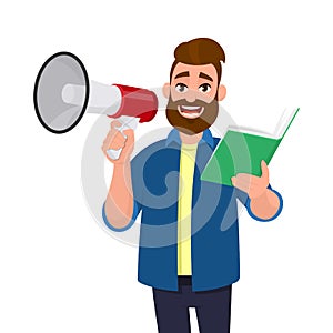 Attractive young man holding a megaphone or loudspeaker and and holding or reading a book, document, file in hand. Announcement,