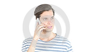 Attractive young man laughing talking on phone , isolated white background