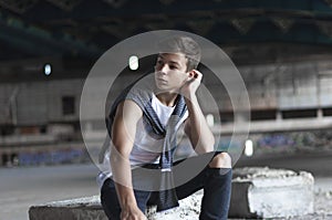 Attractive young man in an old building