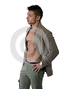 Attractive young man with open jacket on muscular torso