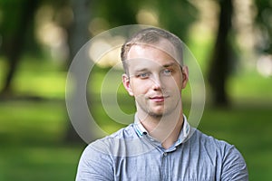Attractive young man outdoor portrait
