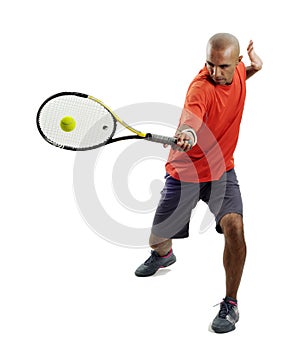 Attractive young man playing tennis portrait