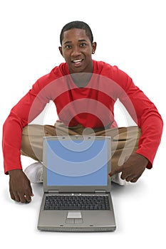 Attractive Young Man Pointing To Laptop Screen photo