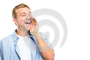 Attractive young man shouting - isolated on white background