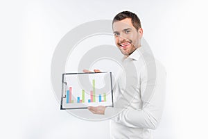 Attractive young man showing a diagrama photo