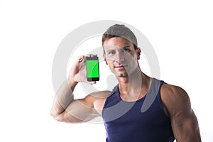 Attractive young man showing his cell phone's blank green screen