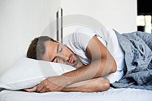 Attractive young man sleeping peacefully