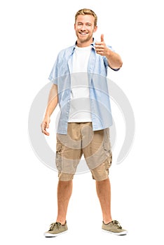 Attractive young man thumbs up full length on white background