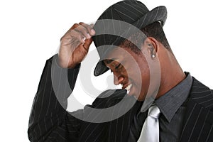 Attractive Young Man Tipping His Hat photo