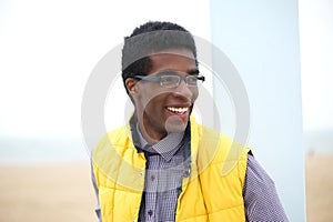 Attractive young man wearing glasses outdoors