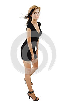 Attractive young model posing in a cute black dress