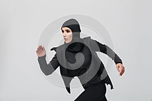 Attractive young muslim woman wearing sport hijab