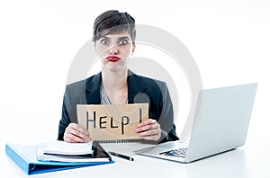 Attractive young overwhelmed and frustrated business woman worki