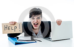 Attractive young overwhelmed and frustrated business woman worki